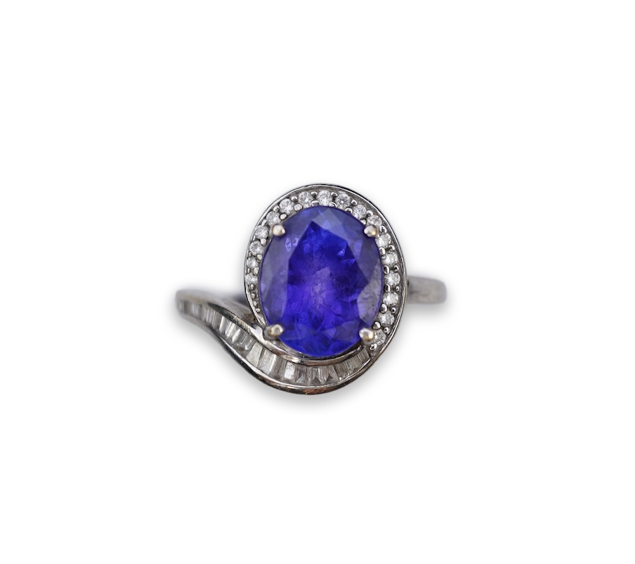 A tanzanite and diamond ring